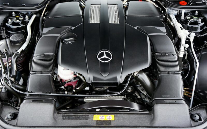 Detailed view of a Mercedes-Benz engine showcasing high-performance automotive design.