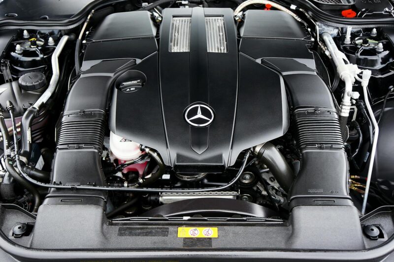 Detailed view of a Mercedes-Benz engine showcasing high-performance automotive design.