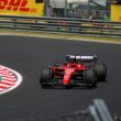 Ferrari F1 car racing at the Hungarian Grand Prix, showcasing thrilling motorsport action.