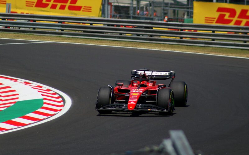 Ferrari F1 car racing at the Hungarian Grand Prix, showcasing thrilling motorsport action.
