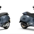 doua scutere vespa de culoare albastra unul langa altul