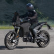motocicleta ducati adventuure neagra pe sosela lanaga o padure