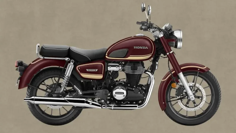 motocicleta clasica de la honda de culoare visinie pe un funda maro