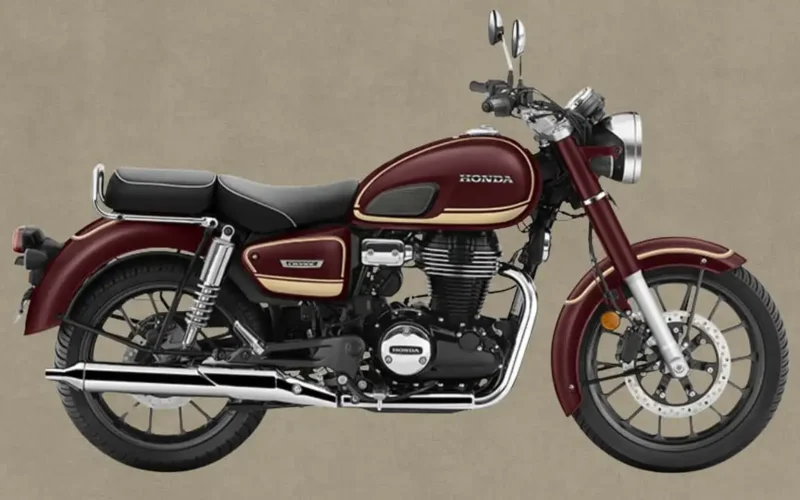 motocicleta clasica de la honda de culoare visinie pe un funda maro